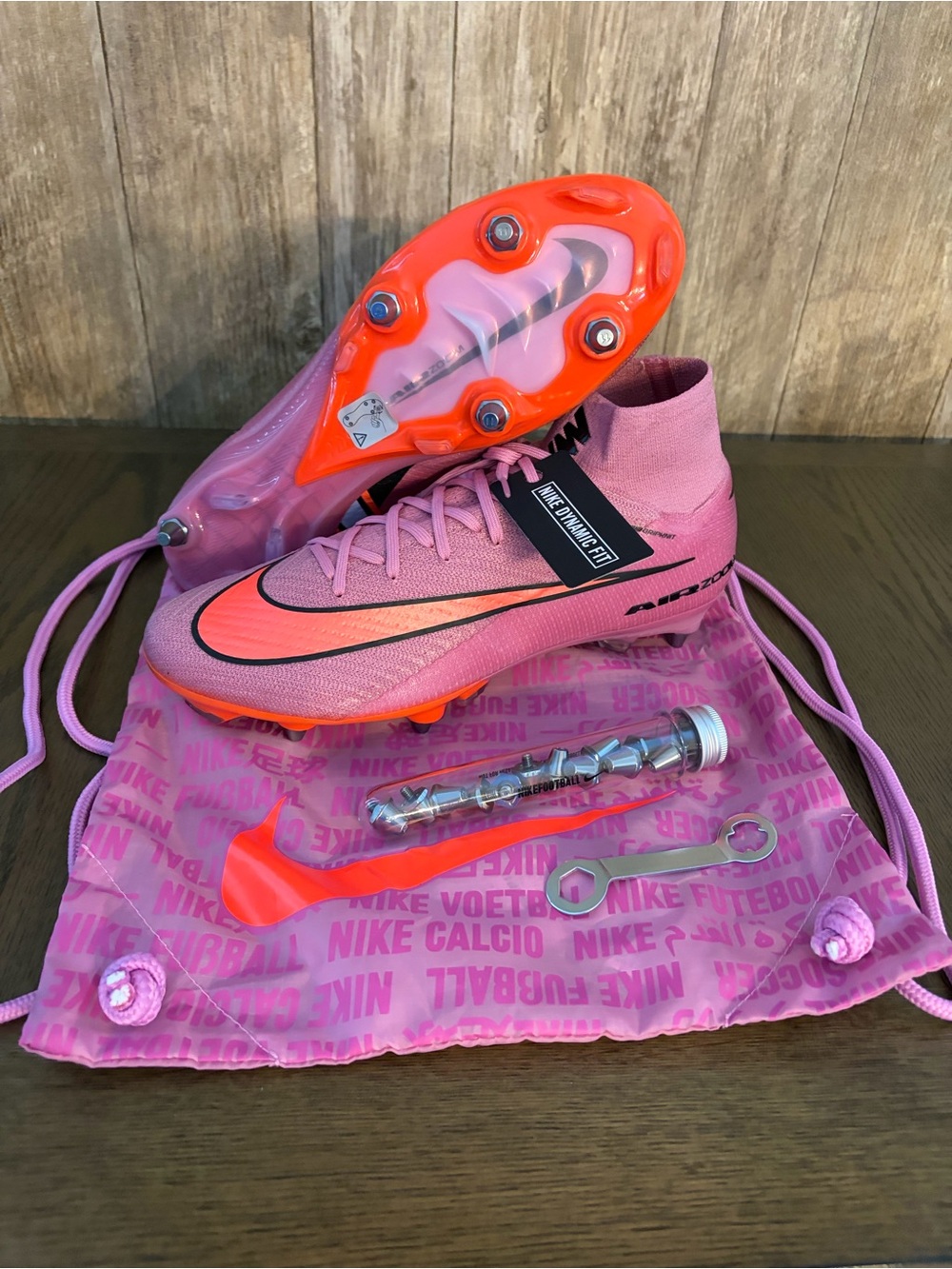 Nike High-Top Soccer Cleats in Pink & Neon Orange